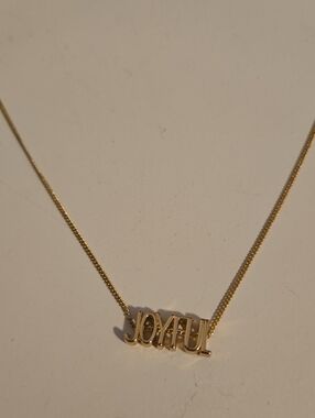 Joyful Gold-Tone Pendant Necklace